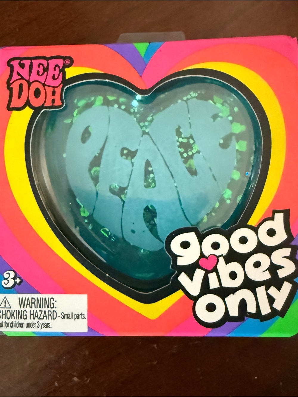 NeeDoh 'Good Vibes Only' blue “peace” heart
